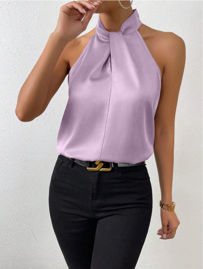 A chic women's top with an eye-catching twist knot neckline.