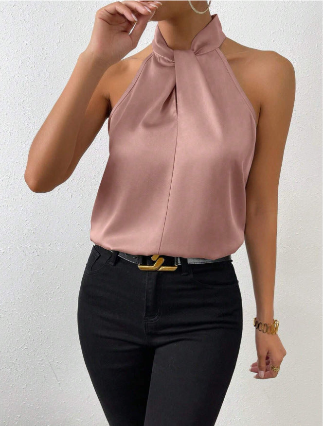 Chic women's top with a flattering twist knot detail, versatile and modern.
