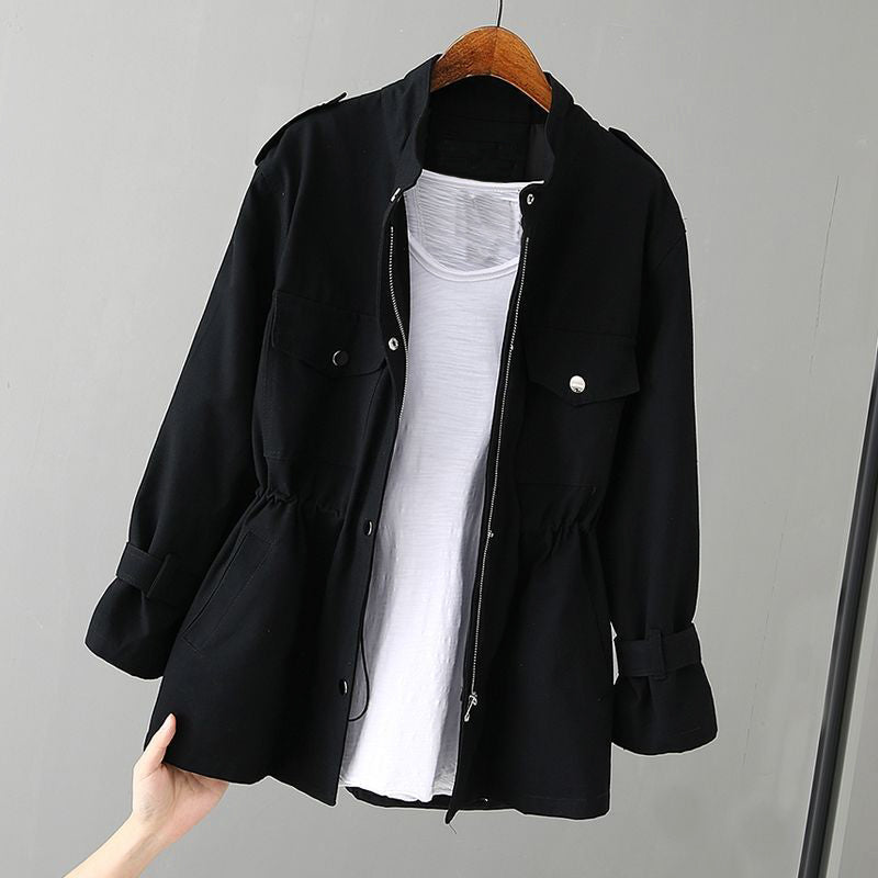 Close-up of a women's utility jacket zipper, highlighting the chic design and practical casual wear appeal.