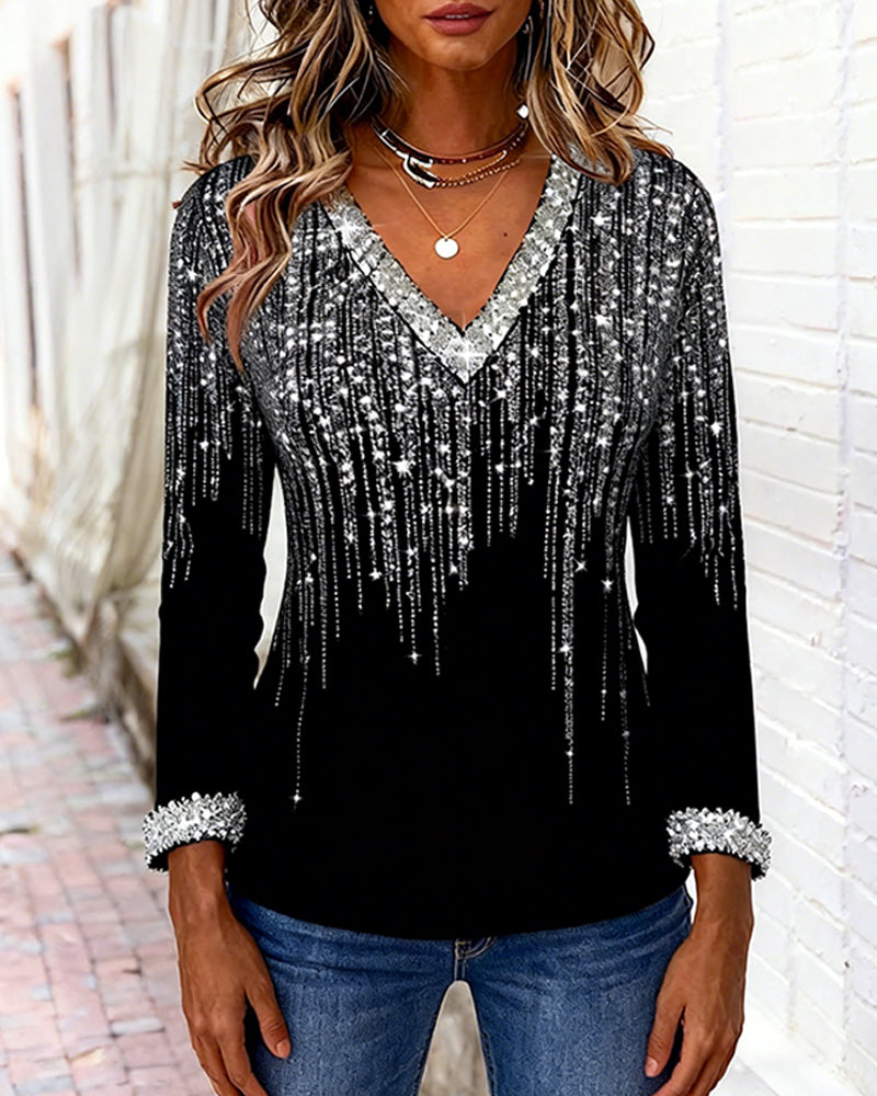 Comfortable women's printed long sleeve V-neck top, a versatile addition to any wardrobe.