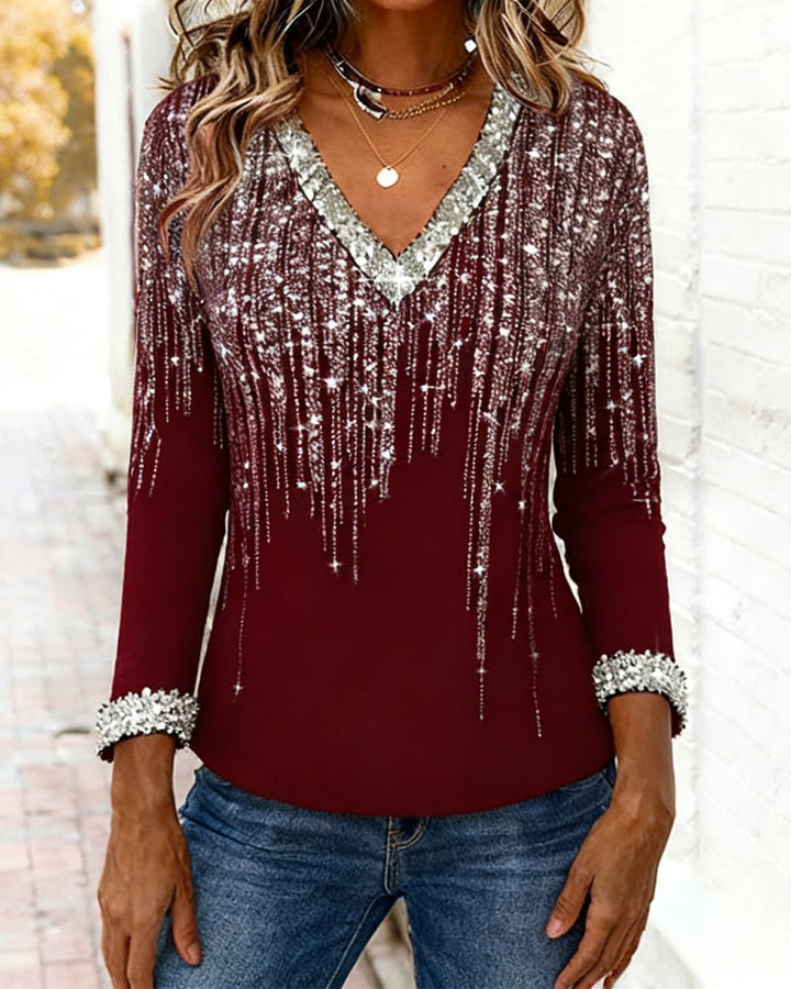 Chic women's printed long sleeve top with a flattering V-neck, suitable for versatile outfits.
