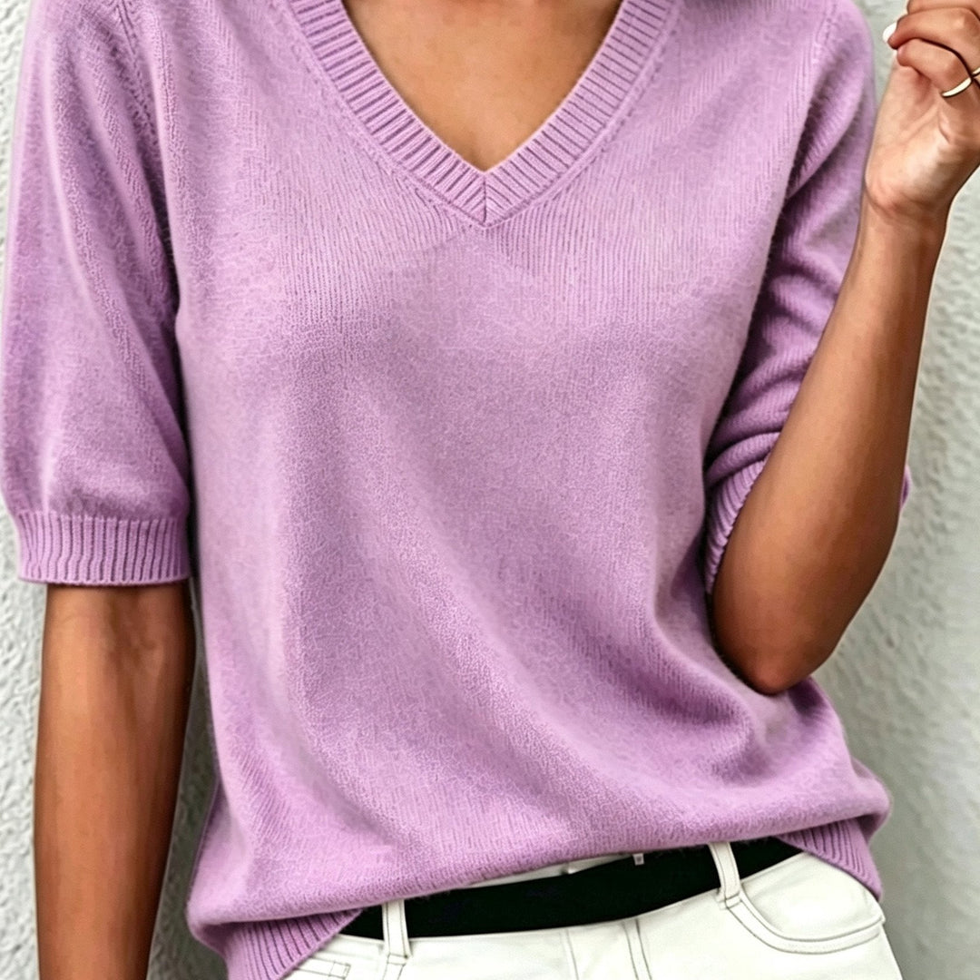 Elegant V-neck short-sleeve women's sweater, great for office wear, smart casual looks, and versatile styling.