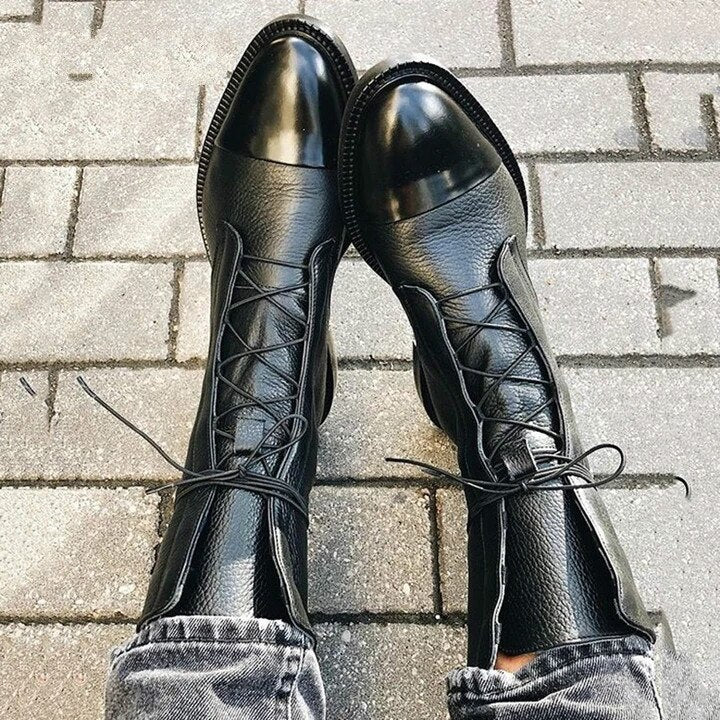 Women's classic black lace-up ankle boots, versatile and durable footwear for fashion-conscious women.