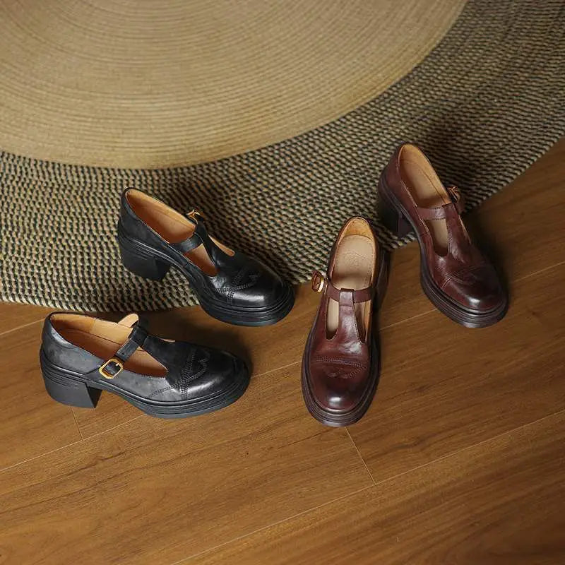 Elegant women's leather block heels with a T-strap design, offering comfort and style