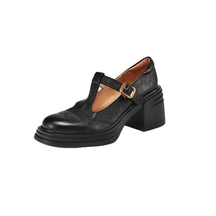 Versatile black leather T-strap block heels, ideal footwear for both work and casual outfits