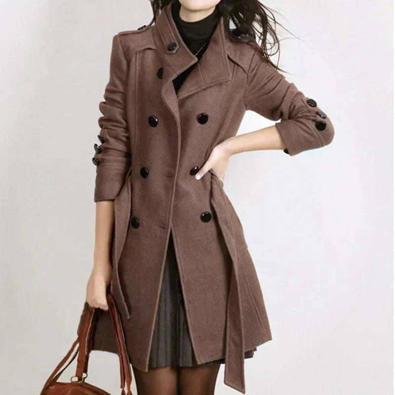 Stylish women's belted winter coat. Classic double-breasted design, perfect for sophisticated fall fashion.