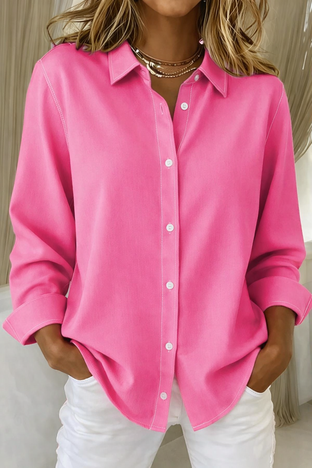 Women's classic long sleeve button-up shirt in a relaxed fit, perfect for versatile everyday and office wear.