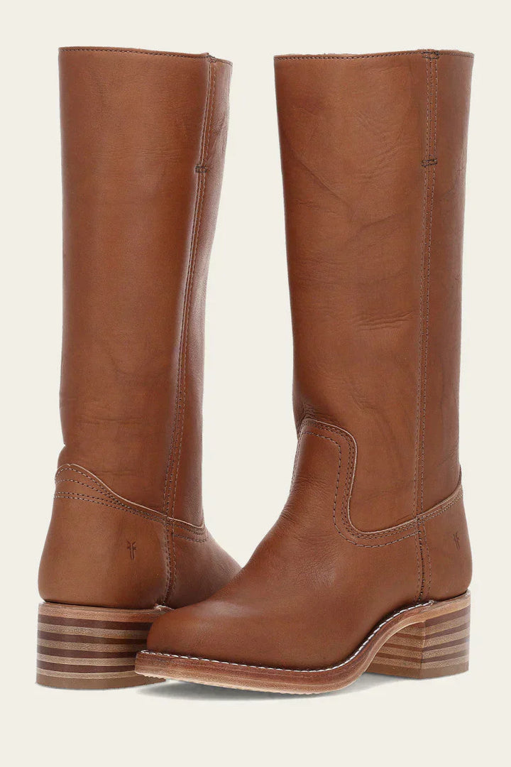 Pair of women's cowboy boots, mid-calf style, in a rich brown leather finish.