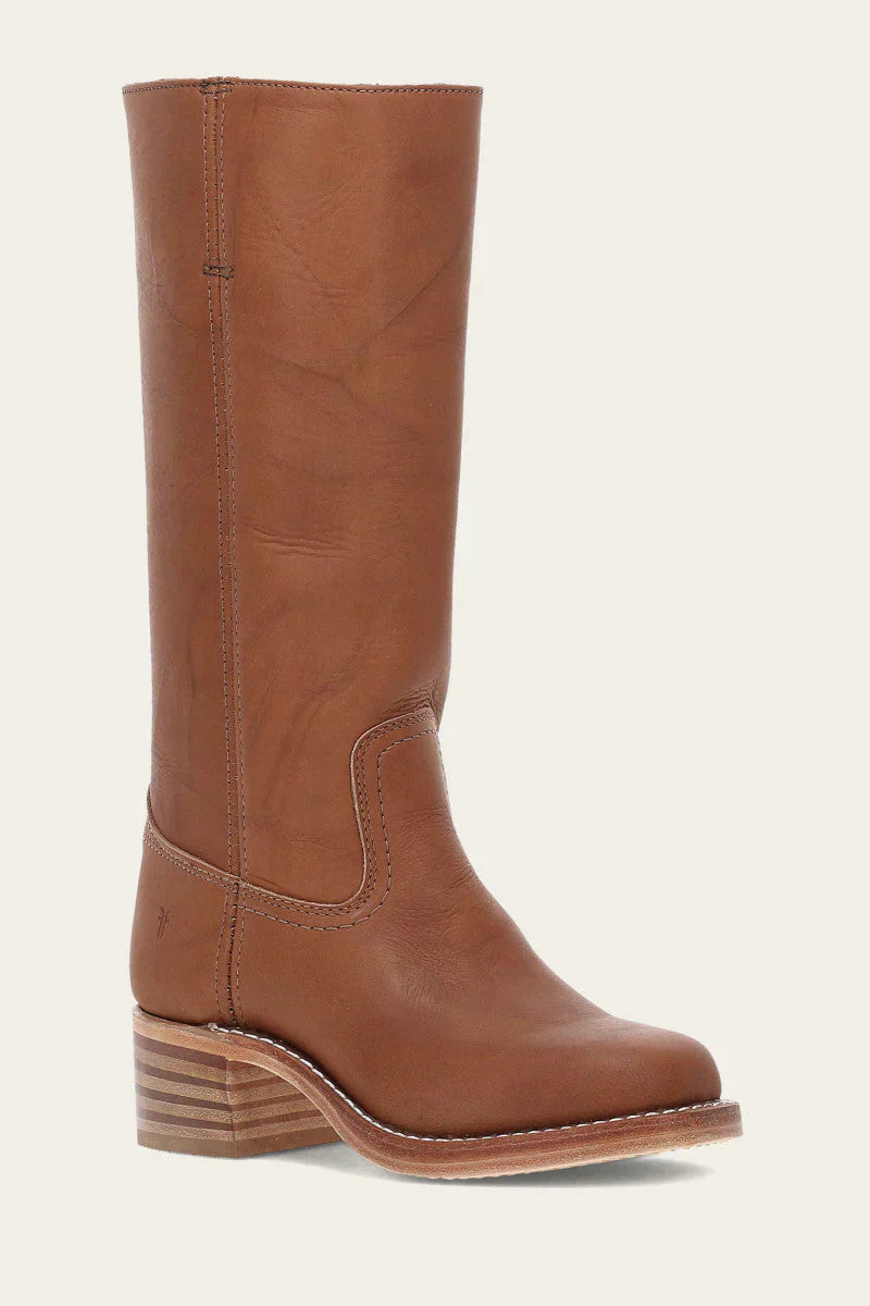 These women's mid-calf western boots feature a durable sole and comfortable fit.