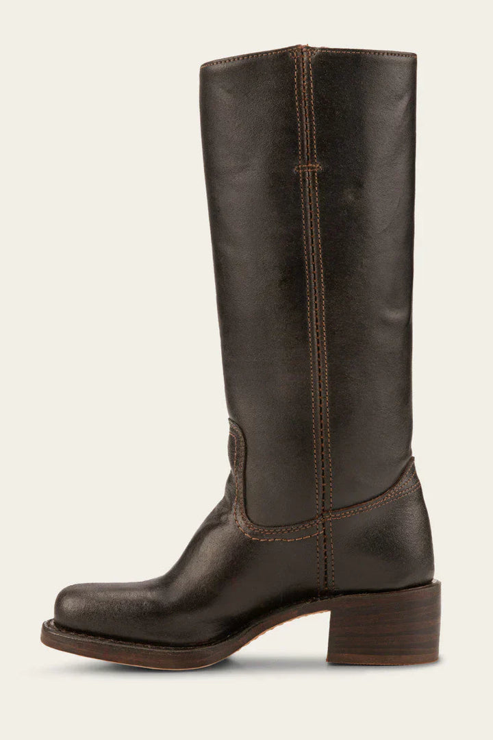 Detail of the leather texture on women's classic mid-calf western boots.