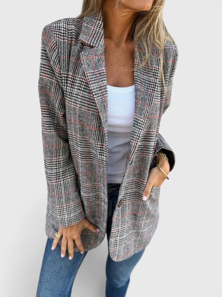 Stylish women's plaid blazer, a versatile boyfriend fit for smart casual or professional workwear outfits.