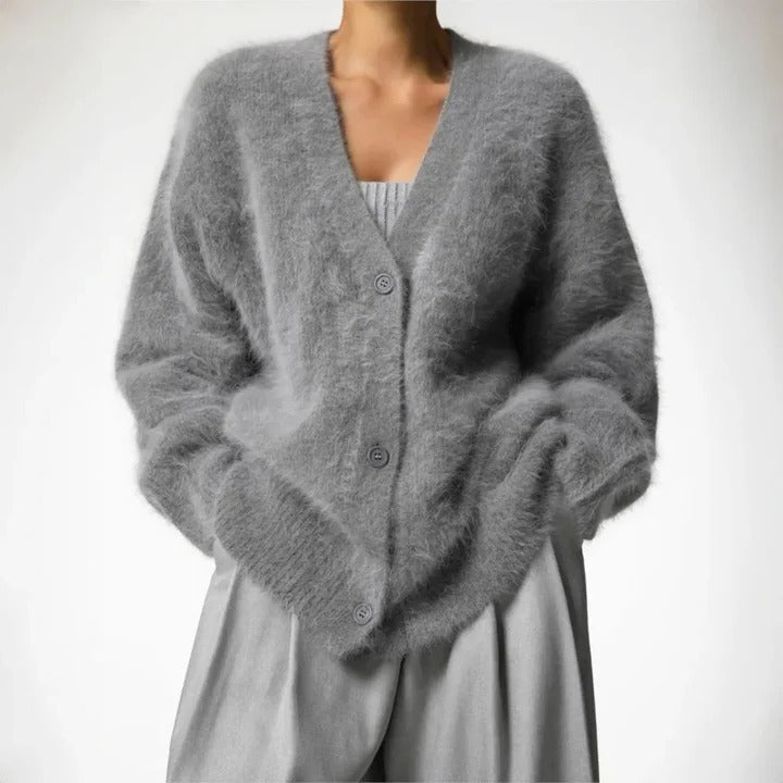Elegant women's classic round neck winter knit sweater. Soft long sleeve warm top, versatile for cozy style.