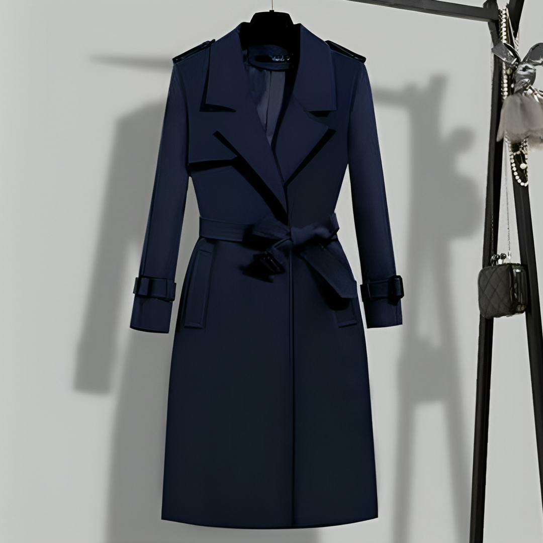 Versatile women's trench coat, classic long jacket with a belt and button details, ideal for elegant fall fashion.