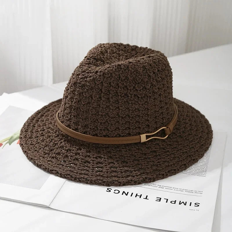 Women's fedora hat, a timeless woven design, complete with a distinctive faux leather trim.