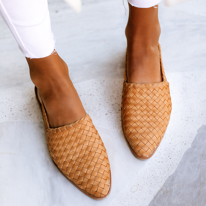 Women's closed toe slip-on flat mules, ideal for effortless everyday casual style.