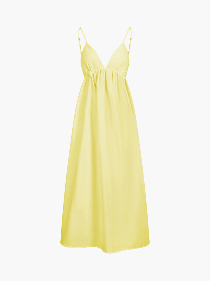 Elegant women's sleeveless v-neck maxi dress with open back. Ideal for summer beachwear.