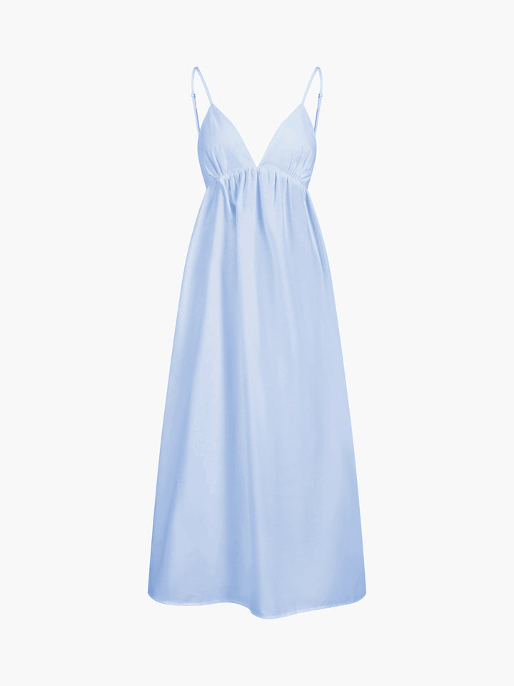 Women's beachwear open back maxi dress. Sleeveless, v-neck, flowy. Perfect for summer leisure.