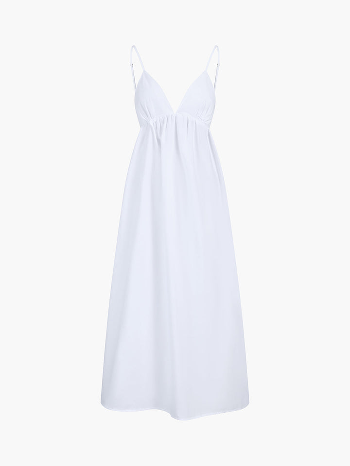 Coastal Cowgirl women's maxi dress, open back & v-neck. Flowy design for summer vacation style.