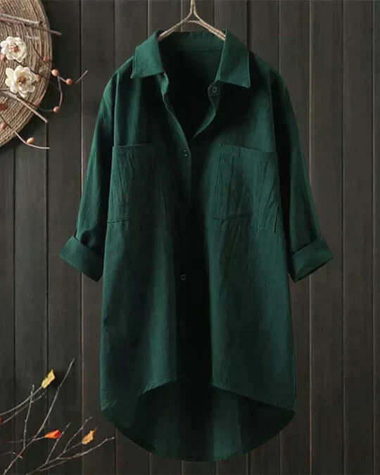 Chic women's longline blouse with roll tab sleeves & double pockets; a comfortable collared casual shirt for any day.