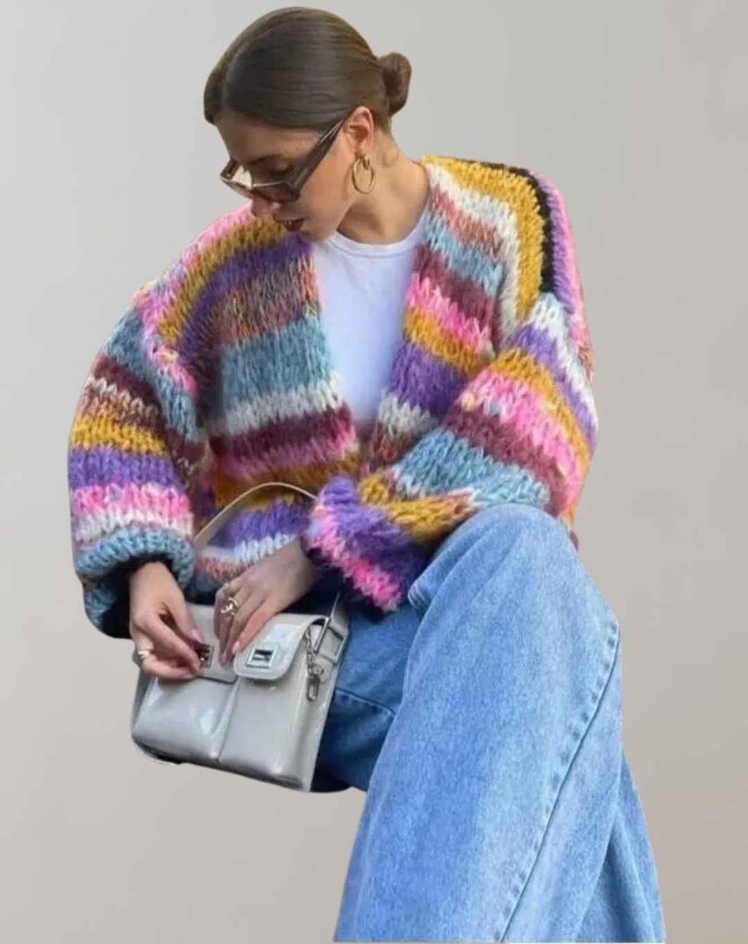 Women's colorful open front knitted cardigan, a cozy and stylish layering piece for autumn and winter fashion.