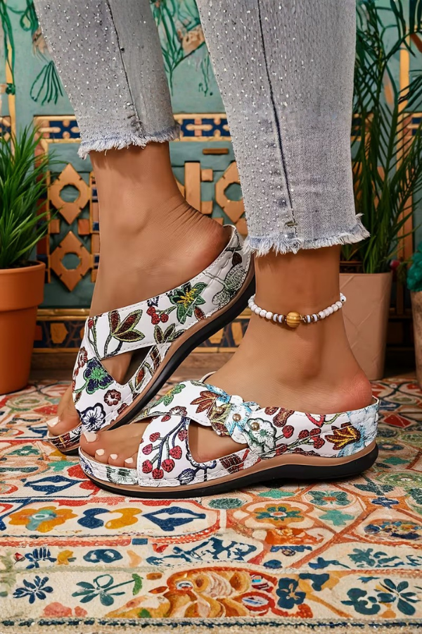 Perforated women's comfort wedge sandals, slip-on design for easy style. Ideal for summer casual outings & walking.