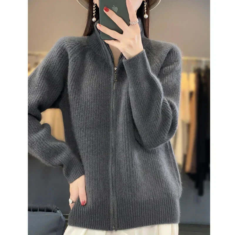 Woman wearing a comfortable zip-front knit sweater, styled for a casual look.