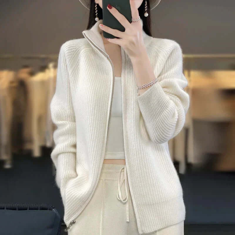 Soft women's knit sweater with a full zip front, great for easy on-off layering.