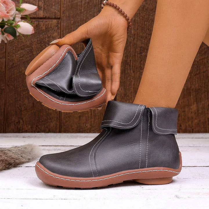 Side profile of women's everyday ankle boots, showing the ergonomic arch support.
