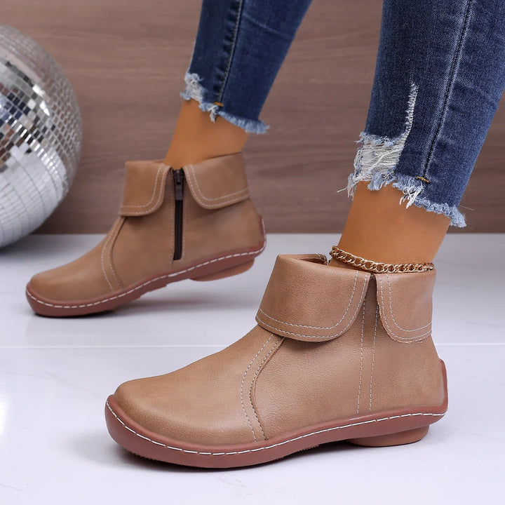 Group photo of comfortable women's ankle boots in various colors, showcasing the collection.
