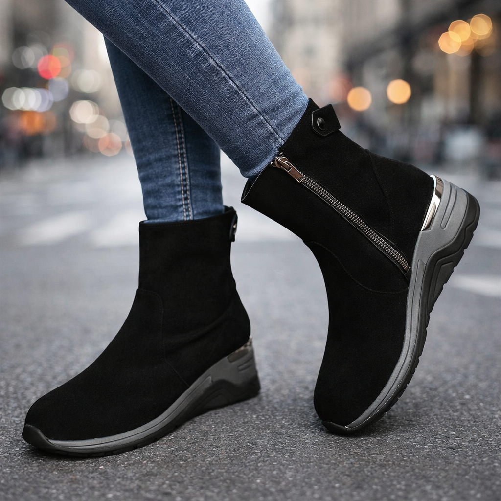 Stylish women's ankle boots featuring a convenient zip closure and shock-absorbing sole.