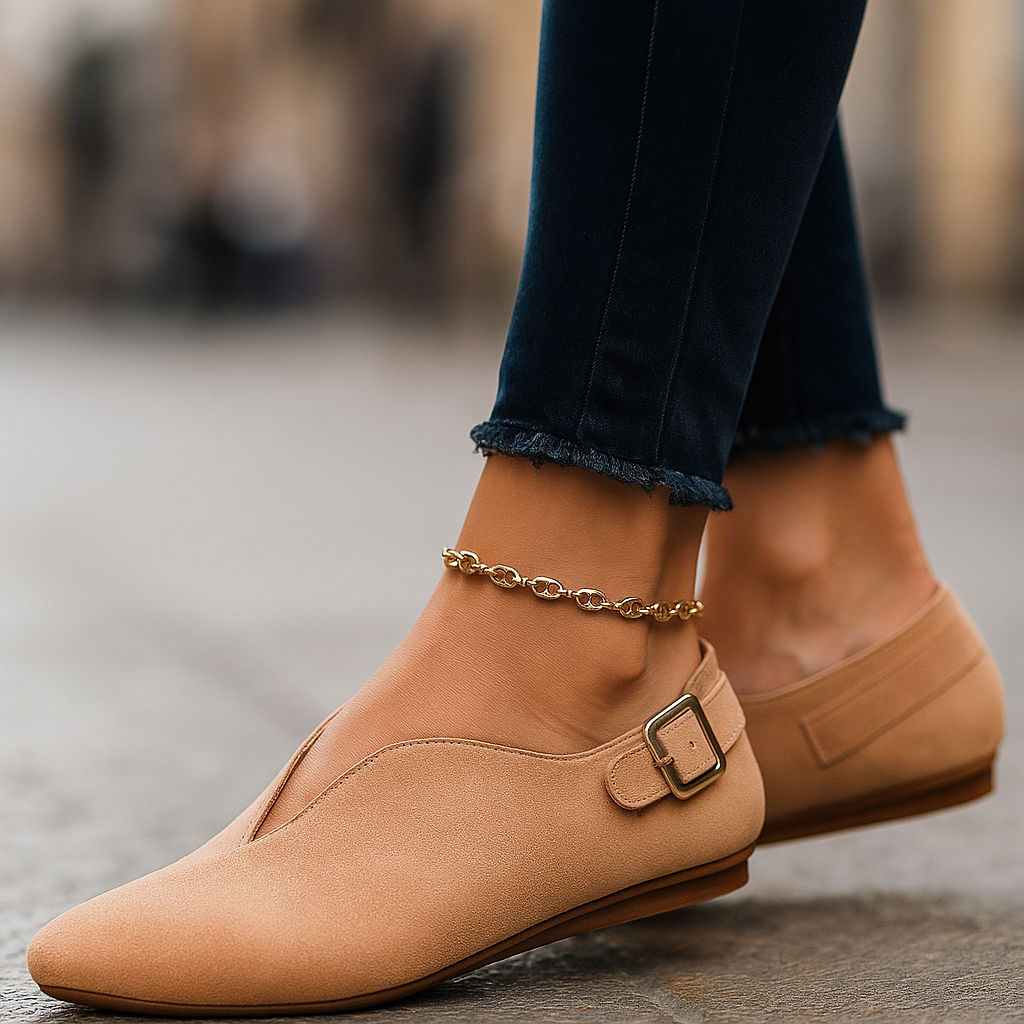 Side view of women's comfort buckle loafers, showcasing the sleek design and low heel
