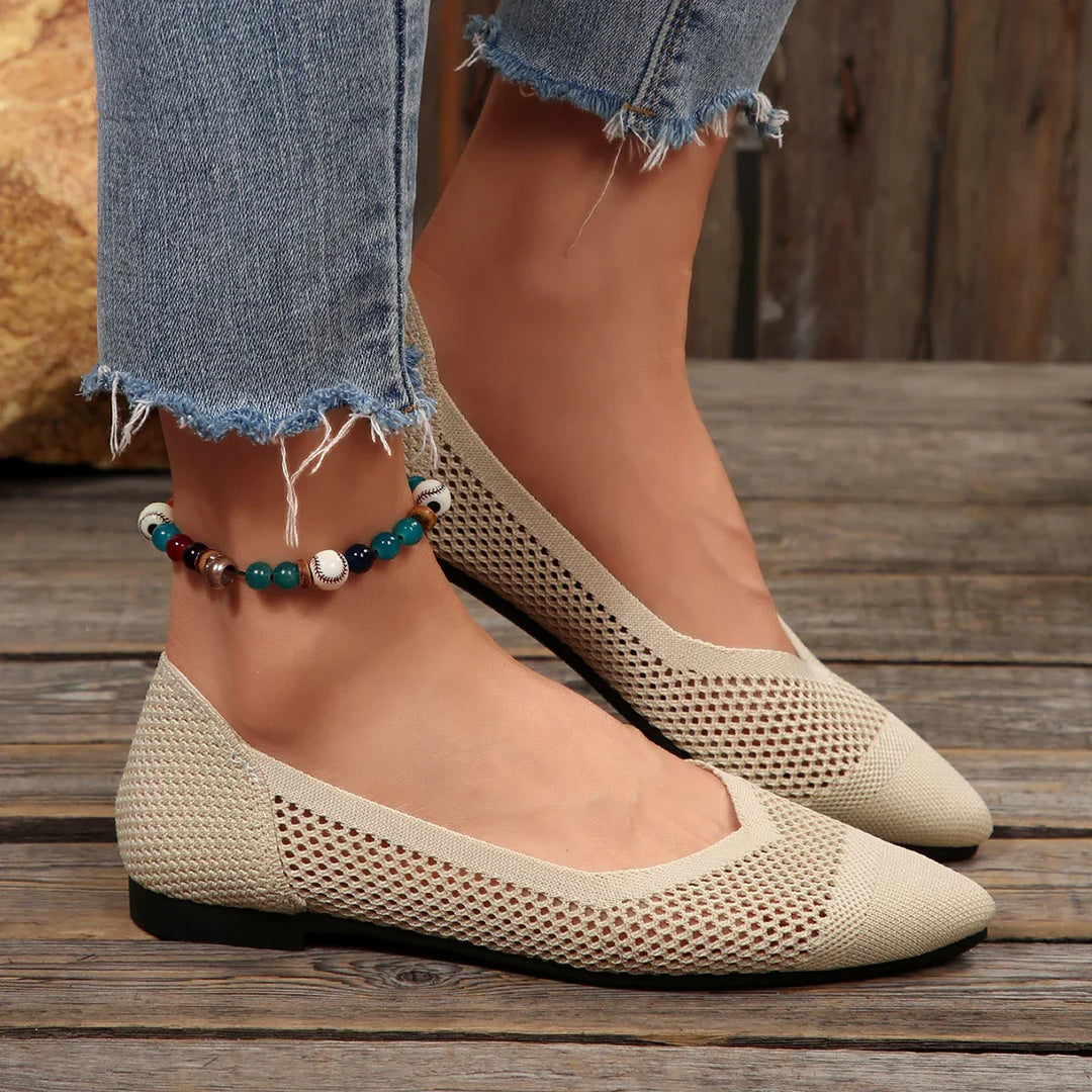 Comfortable knit pointed toe flats for women in a vibrant pink, emphasizing style and comfort.