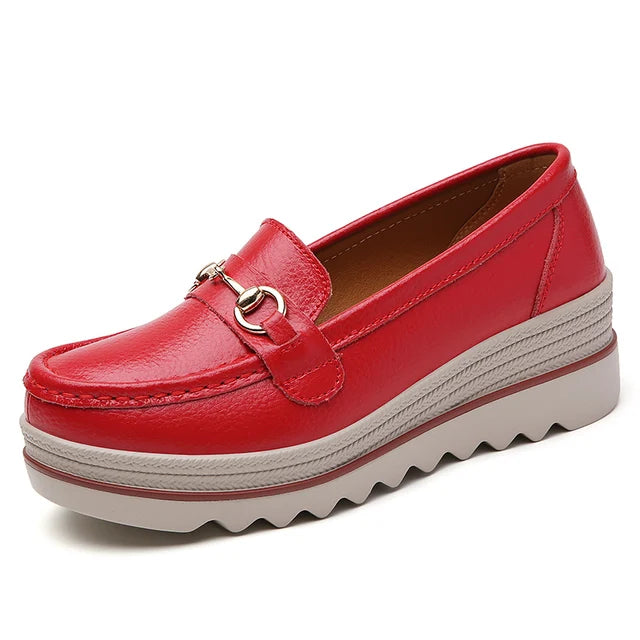 Orthopedic black platform loafers, designed for women seeking comfort and style