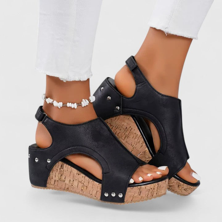 Stylish women's beige wedge sandals for summer. Versatile casual footwear with a comfortable ergonomic design.