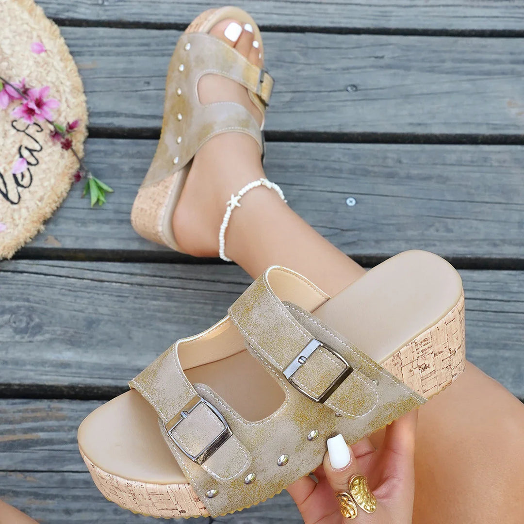 Top-down view of comfortable women's buckle slide sandals in a vibrant red, featuring adjustable double straps.
