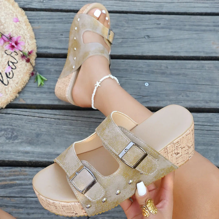 Top-down view of comfortable women's buckle slide sandals in a vibrant red, featuring adjustable double straps.