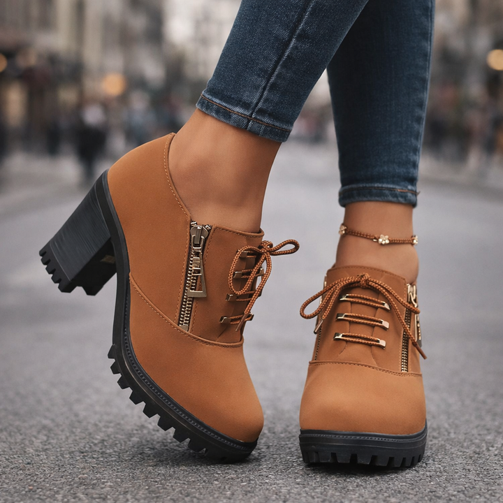 Women's comfortable brown block heel ankle boots with laces, perfect for everyday wear.