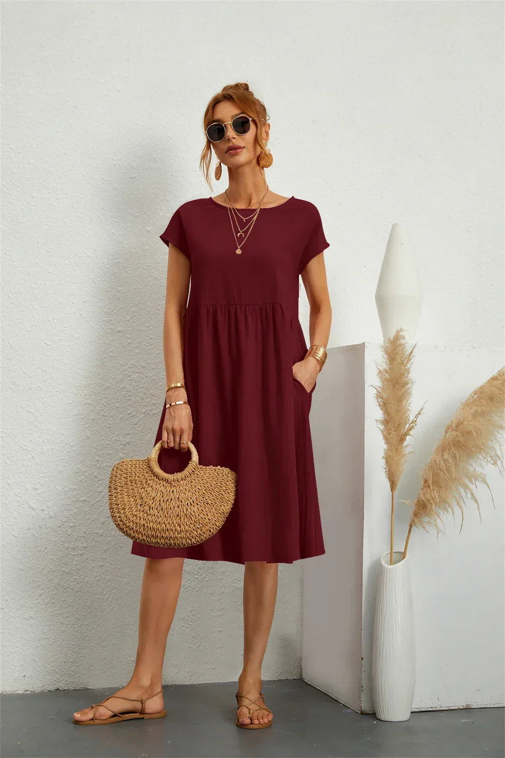 Women's versatile midi dress, a comfortable and casual style with essential pockets for daily fashion.
