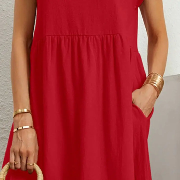 Model wearing a comfortable women's midi dress with pockets, perfect for everyday chic style.