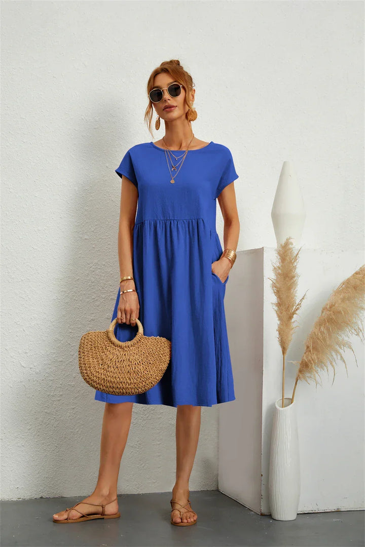 Easy-to-wear women's casual midi dress, extremely comfortable with functional pockets.
