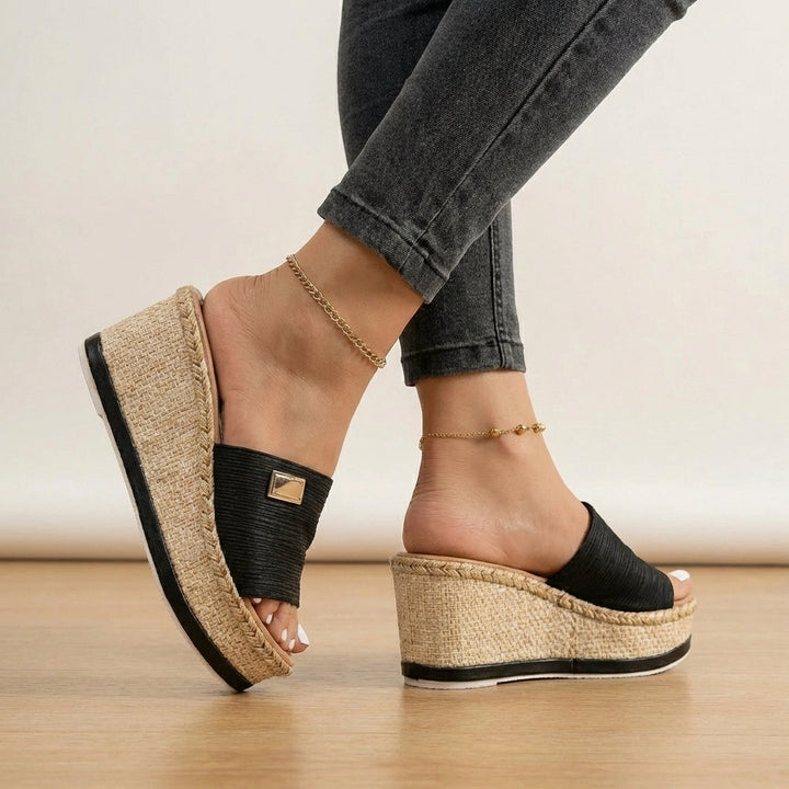 Women's comfortable espadrille wedge sandals with textured straps, perfect for summer bohemian style.