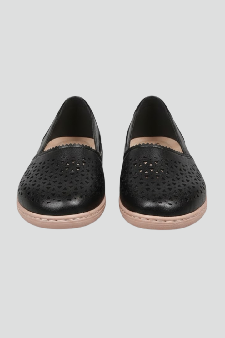 Women's comfortable everyday shoes with stylish cut-outs, perfect for casual walking.