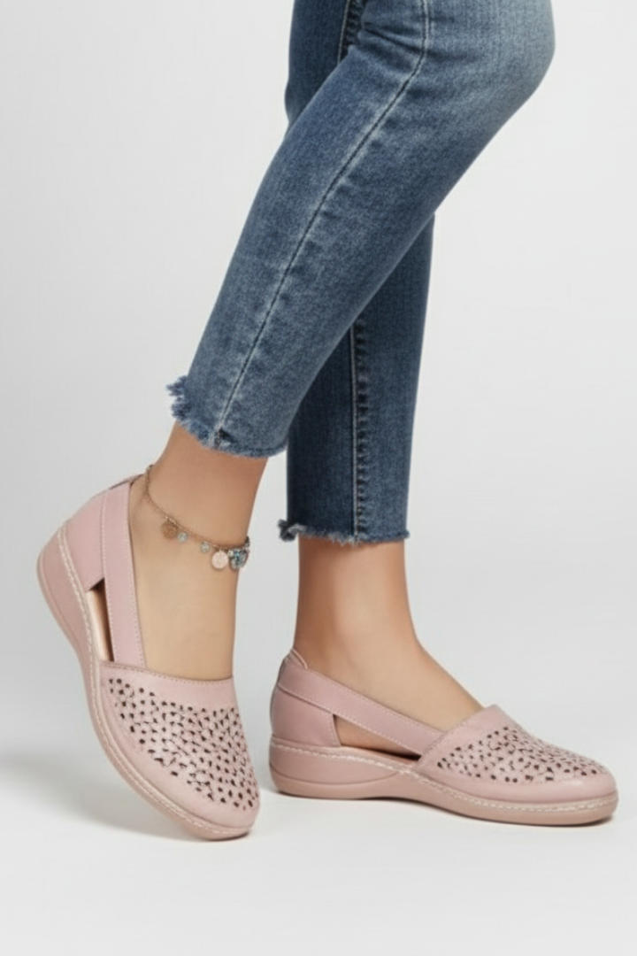 Comfortable & stylish women's everyday shoes with unique cut-outs for a modern casual look.