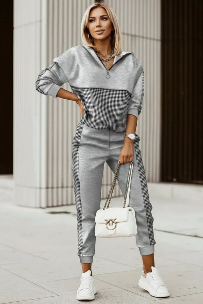 Stylish women's athleisure tracksuit set; versatile for travel, activewear & casual outfits.