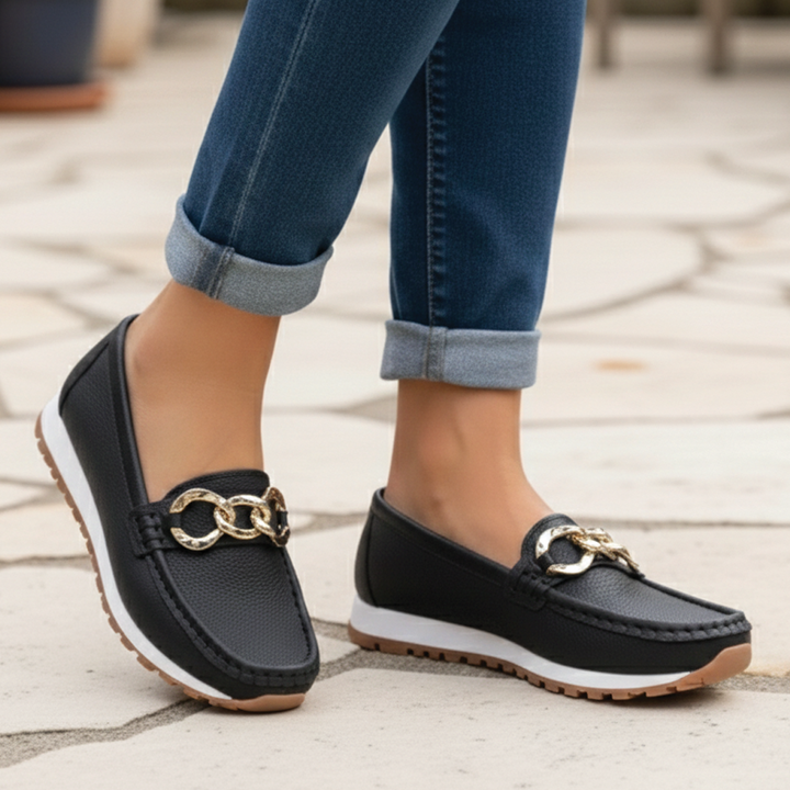 Khaki women's flat buckle loafers, perfect for casual or work wear. Comfortable slip-on design.