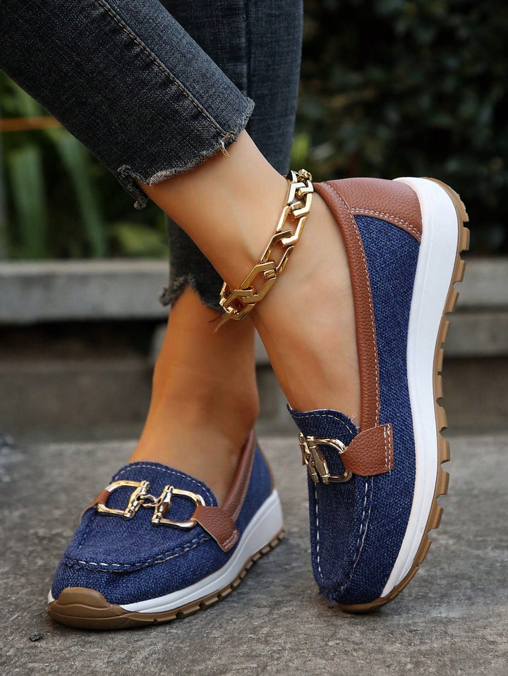 Black women's buckle loafers. Versatile flat shoes, ideal for daily wear & professional settings.
