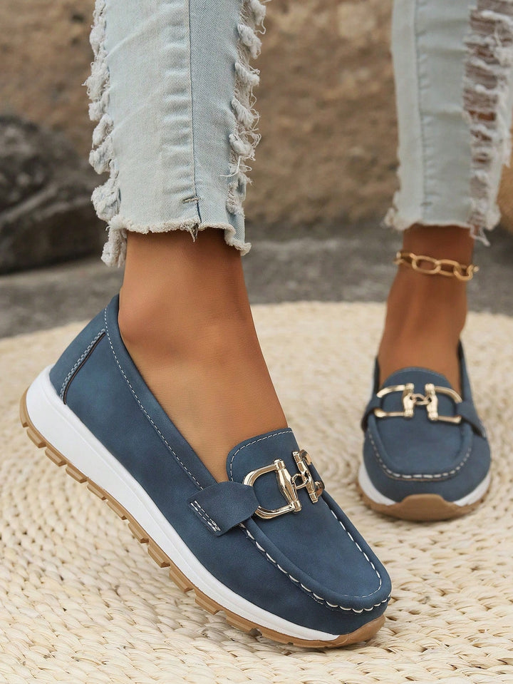 Women's comfortable slip-on flat loafers with buckle detail. Perfect casual shoes for daily wear.