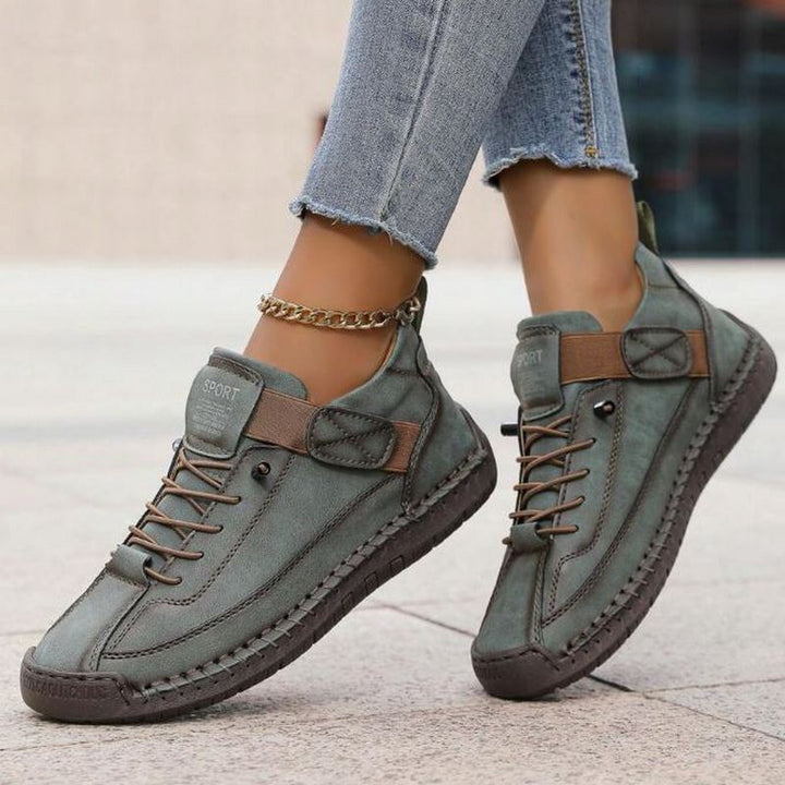 Comfortable women's everyday flat sneakers. Lace-up design and stitch detail combine for a fashionable & unique look.