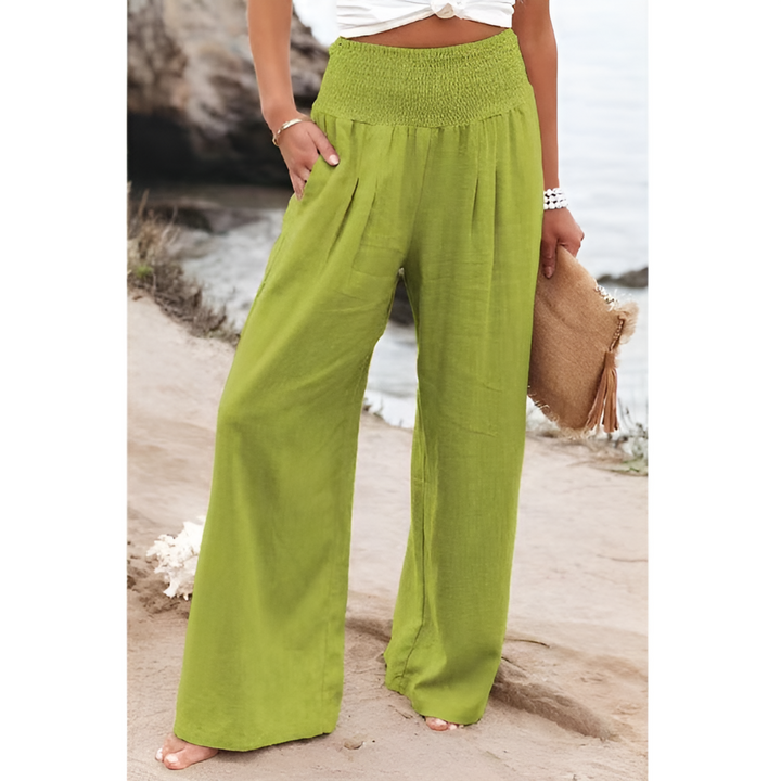 Close-up of comfortable high-waisted stretch linen trousers, highlighting fabric texture & waist detail.