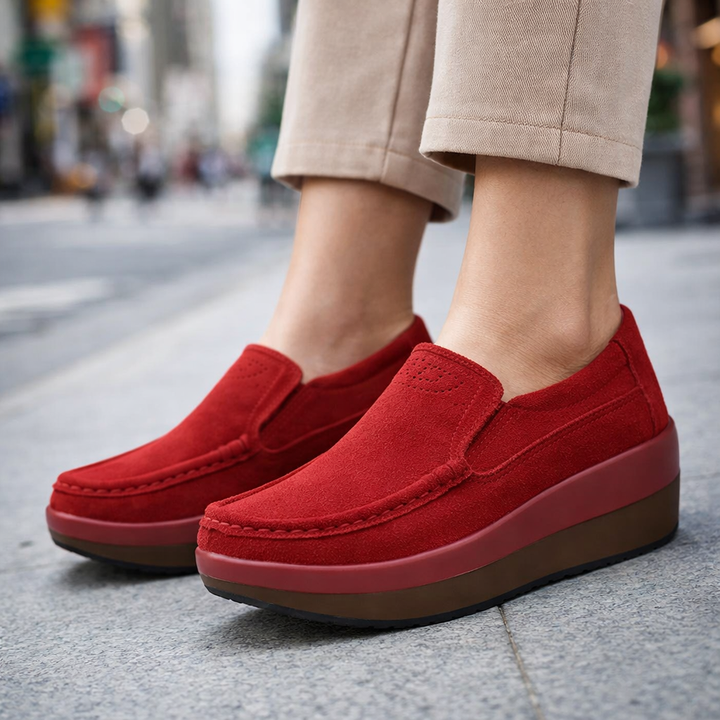 Stylish women's black suede flat loafers with slip-on design, ideal for comfort and casual wear